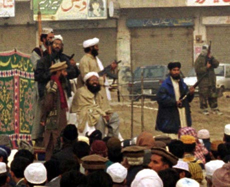 Masood Azhar (middle) at a terrorist recruitment drive in Pakistan - Outlook Online